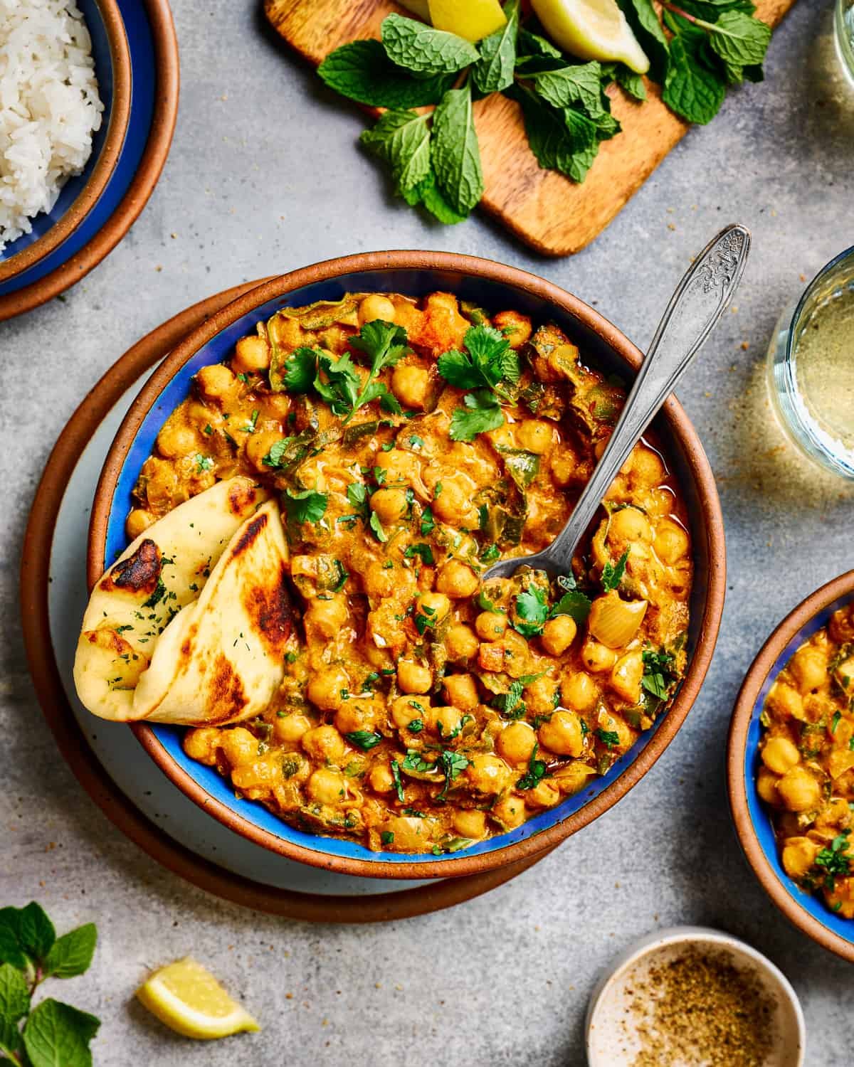 fresh homemade chickpea curry served naan bread