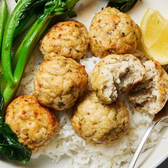 chicken meatballs 2 Homemade Easy chicken meatball served on rice with spinanche
