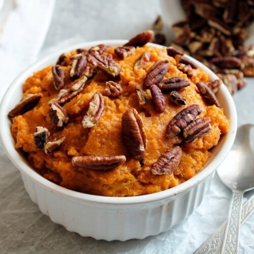 Homemade sweet potato mash topped with peacan nuts