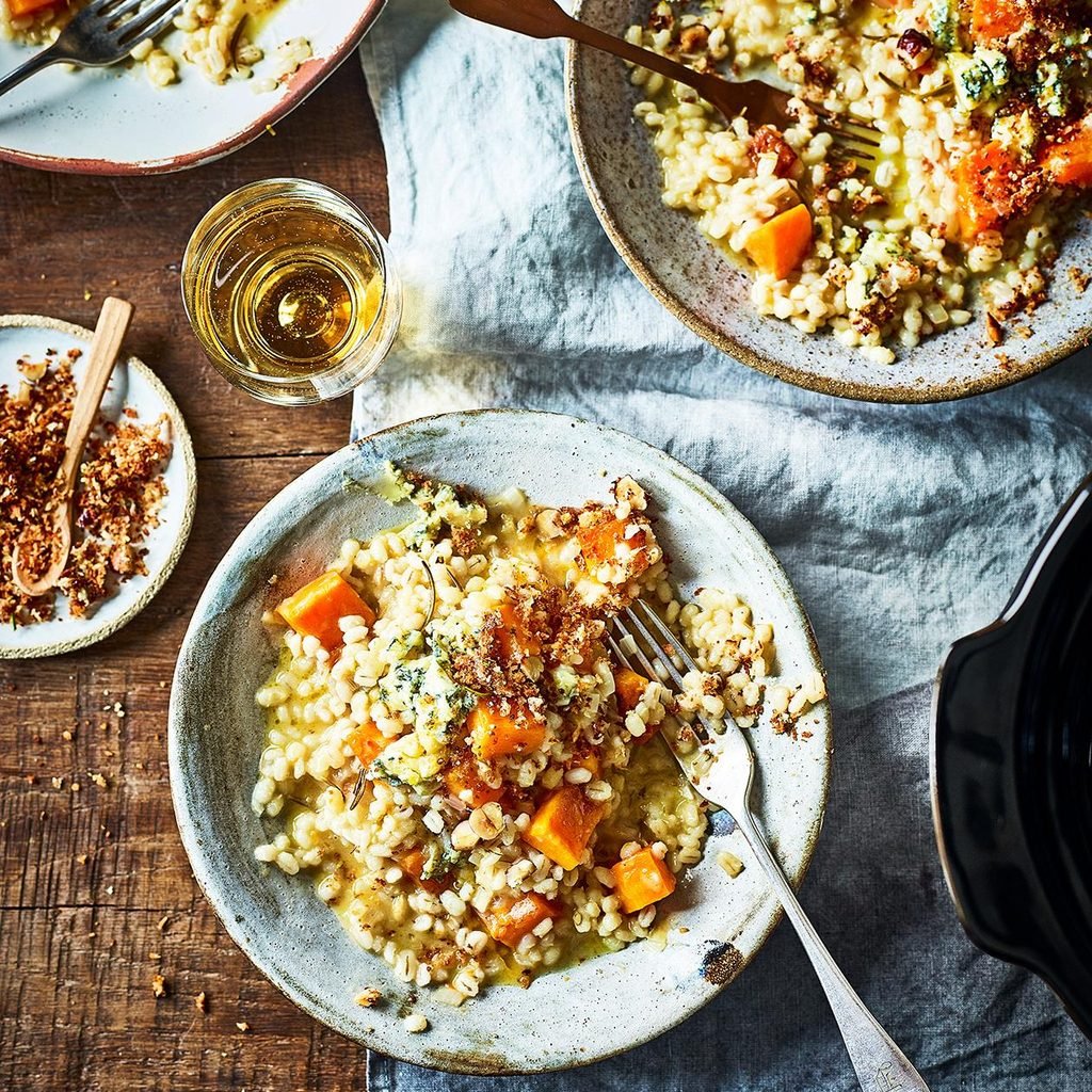 homemade butternut and barley risotto served in round bowls on a table butternut risotto 