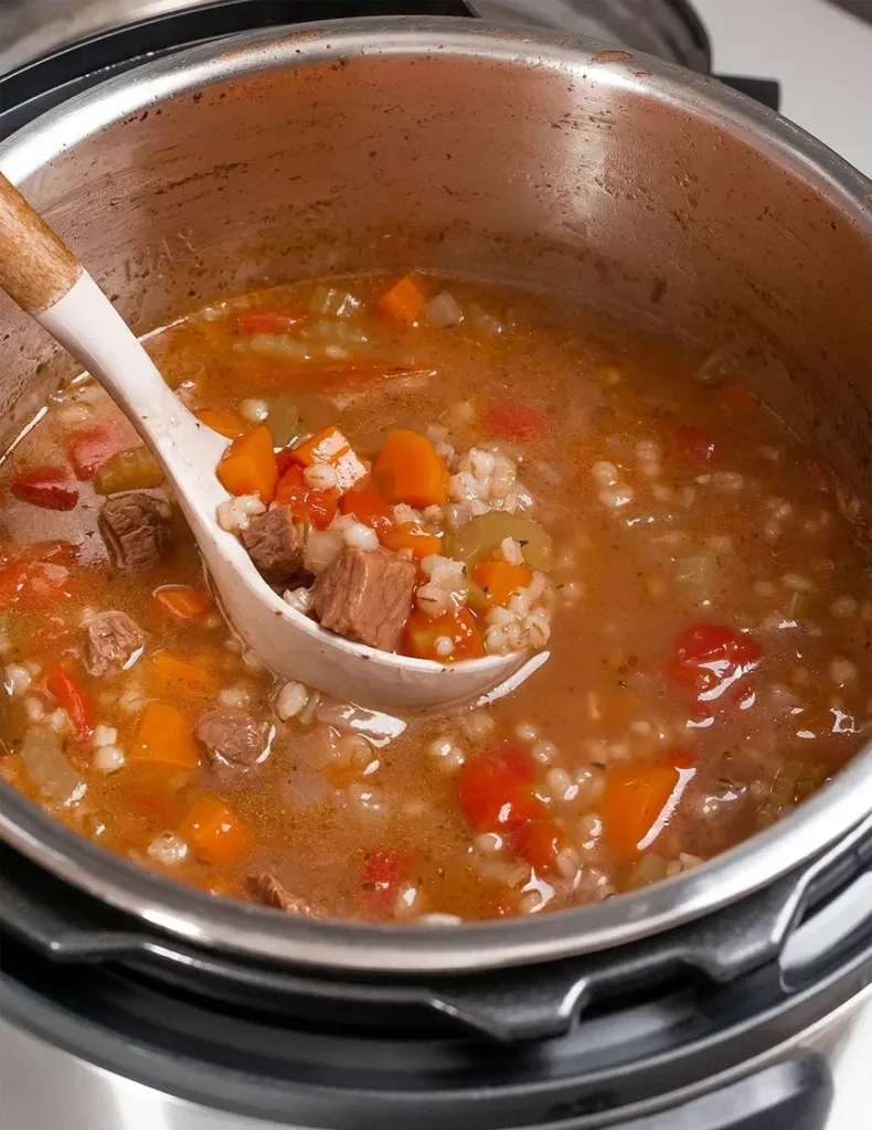 Instant pot beef barley soup in a pressure cooker