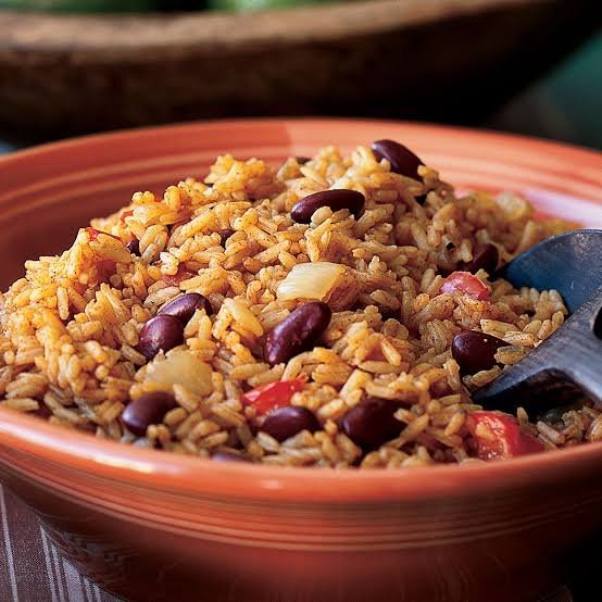 upclose cajun red beans rice served in a round brown bowl